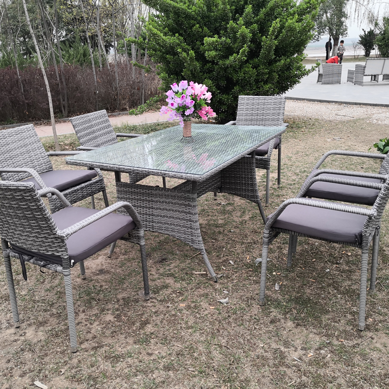 Rectangular outdoor dining set garden rattan dining table chairs Featured Image